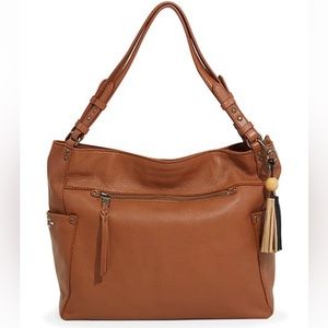 The Sak (looks brand new) super big for all your items